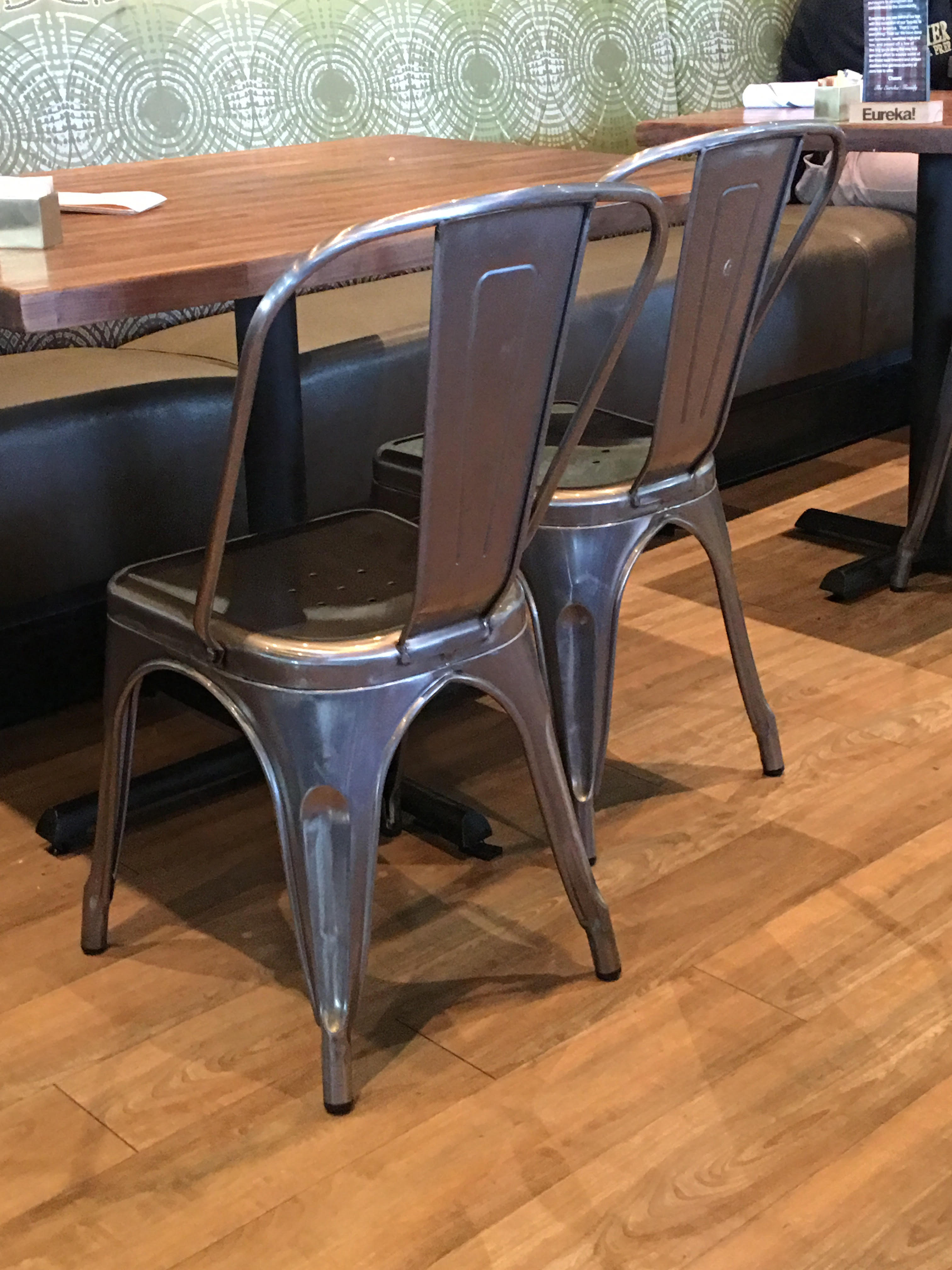 Tolix The Dining Chair All Big Guys Tolix Chairs Where Invented In 1934 France As A And Sy Bistro Chair They Have Holes The Seats So Water Could Run Off When Used Outside