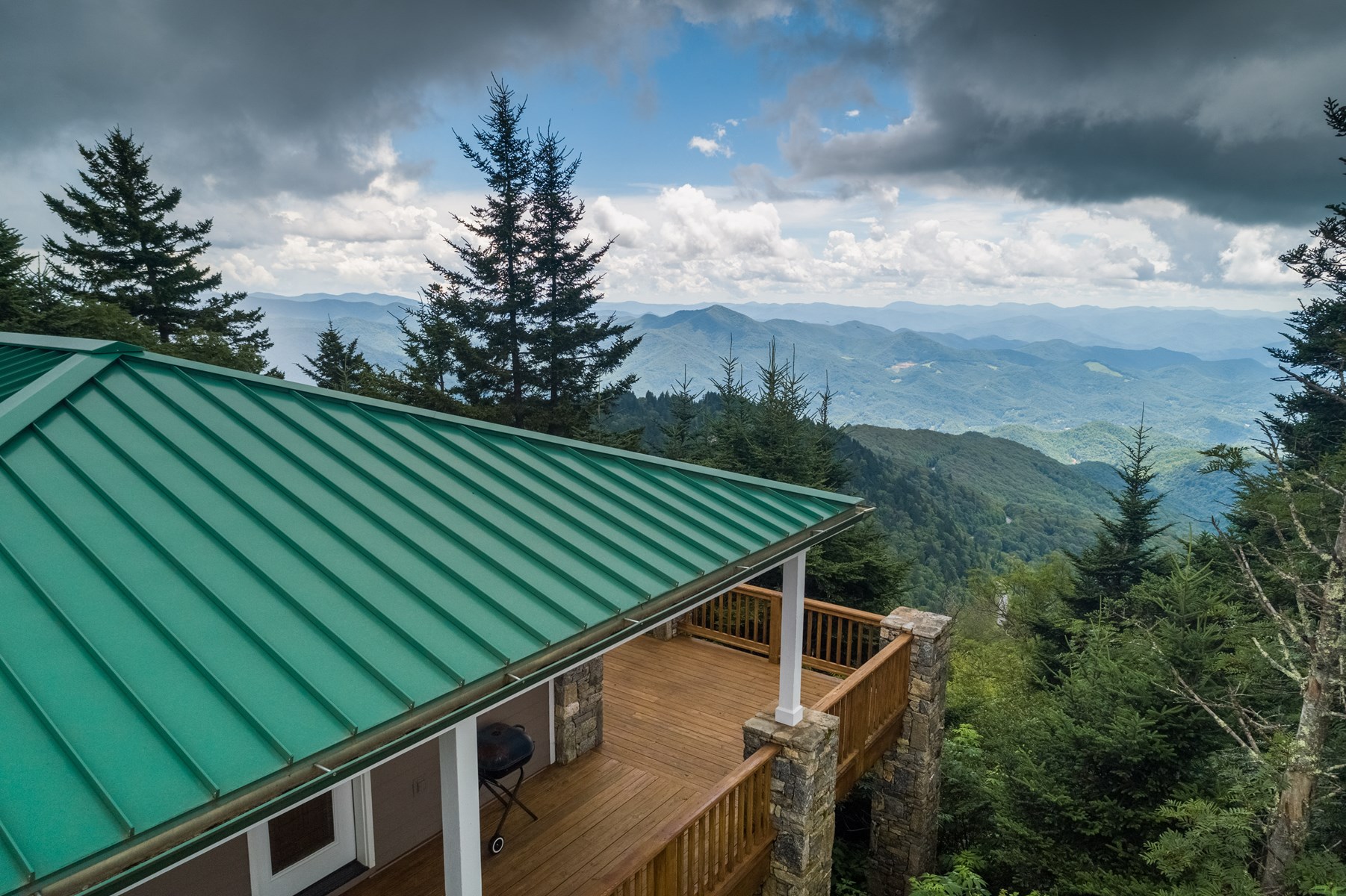 Located on Mount Lyn Lowry near the town of Balsam, the property has long-range layered mountain views of the Pisgah National Forest and Blue Ridge Mountains.