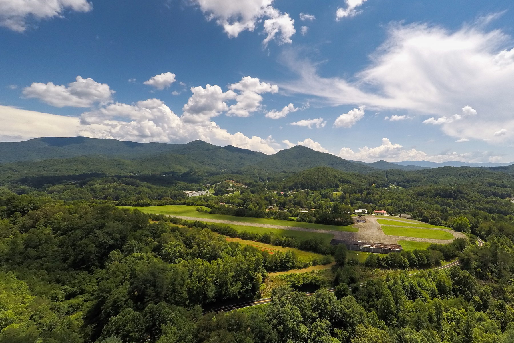 This ~104 acre tract is in an opportunity zone. Includes ~60 acres located within city limits and ~70 acres of ridgeline watershed forest. Airstrip overlooks Bryson City and the Tuckasegee River.
