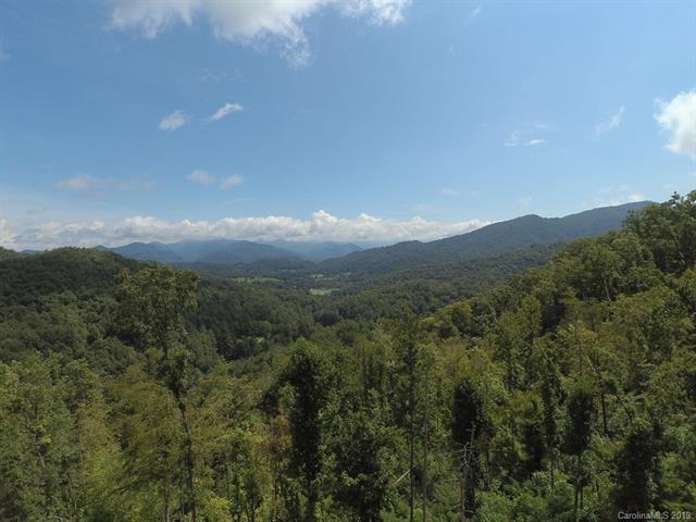 ~32 acres less than 5 minutes from Western Carolina University with awesome long range (200 degree) views from the picturesque knoll.