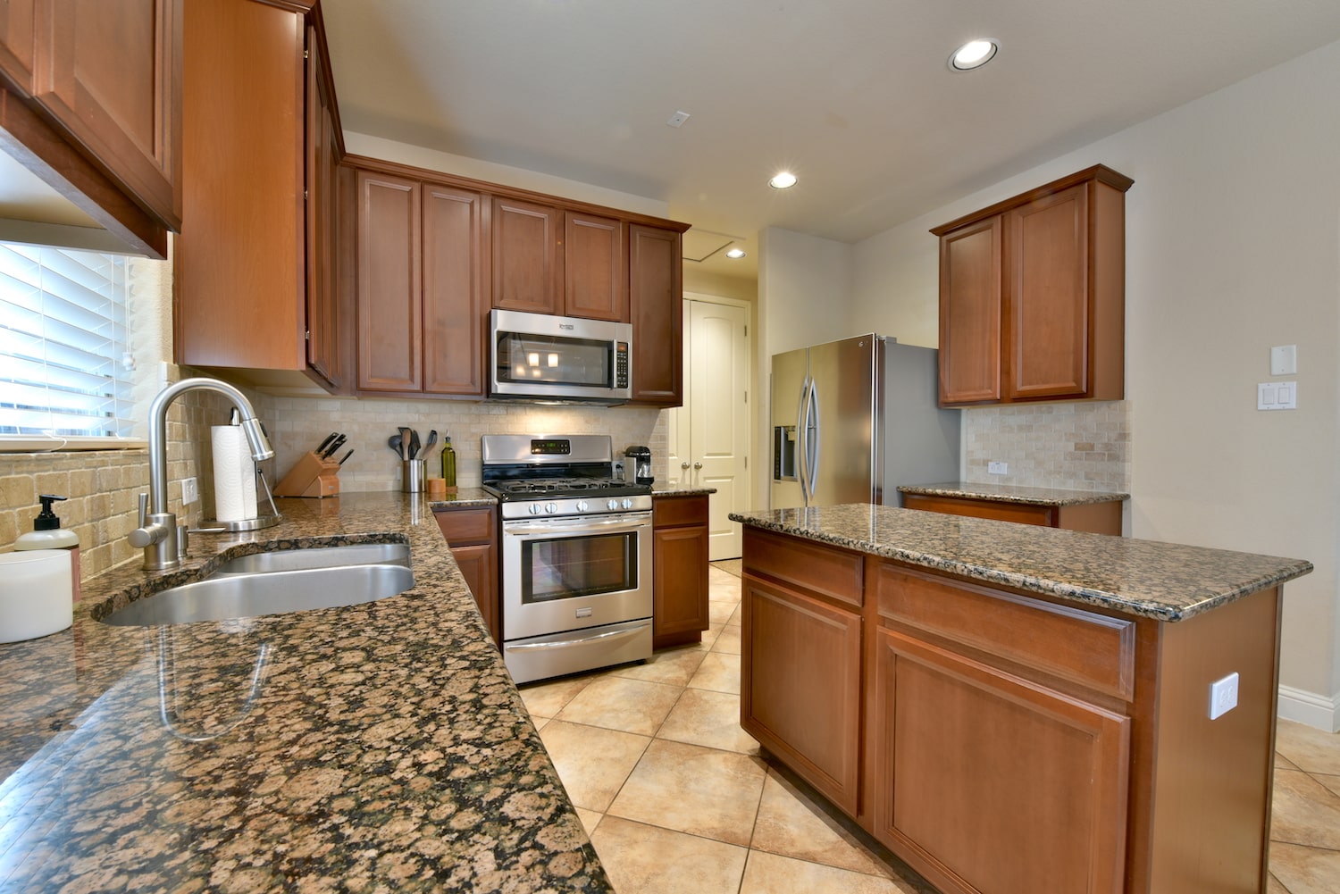 image of kitchen with granite countertops for real estate photography austin