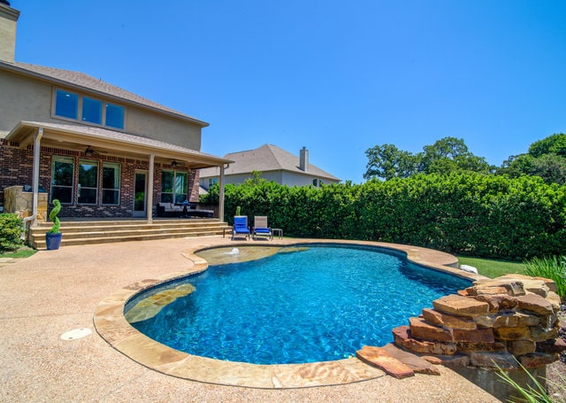 image of flint rock home for sale with pool for real estate photography austin
