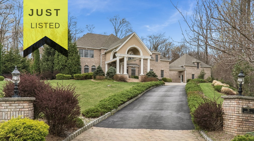 Exquisite estate offers a luxurious lifestyle in Sparta Township!