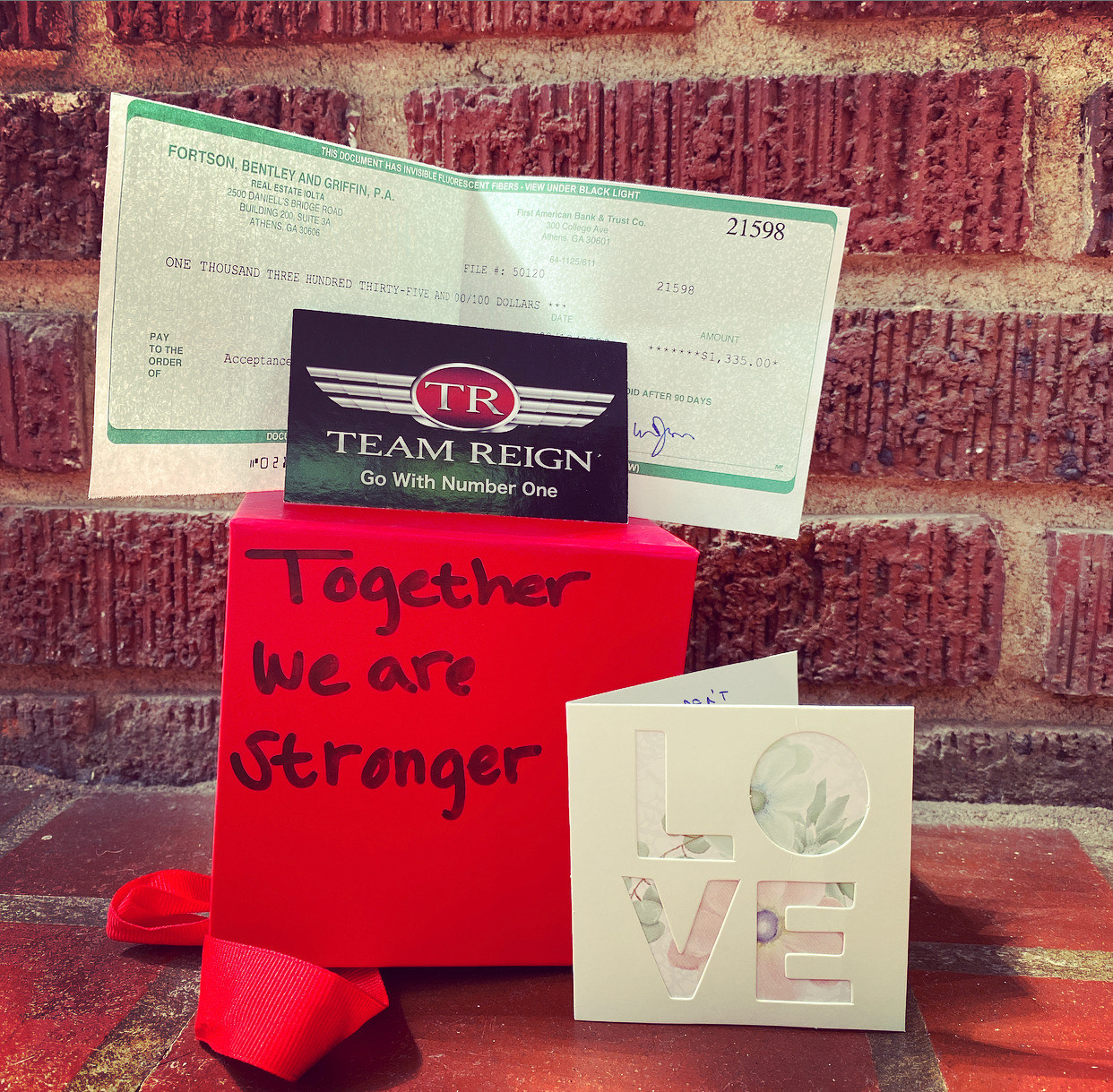 TEAM REIGN makes a GIVE BACK to the Acceptance Recovery Center.