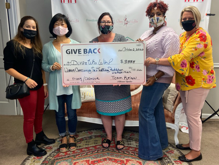 TEAM REIGN GIVES BACK to DIVAS Who Win Freedom Center