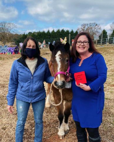 Amy McBride GIVES BACK to Butterfly Dreams Farm
