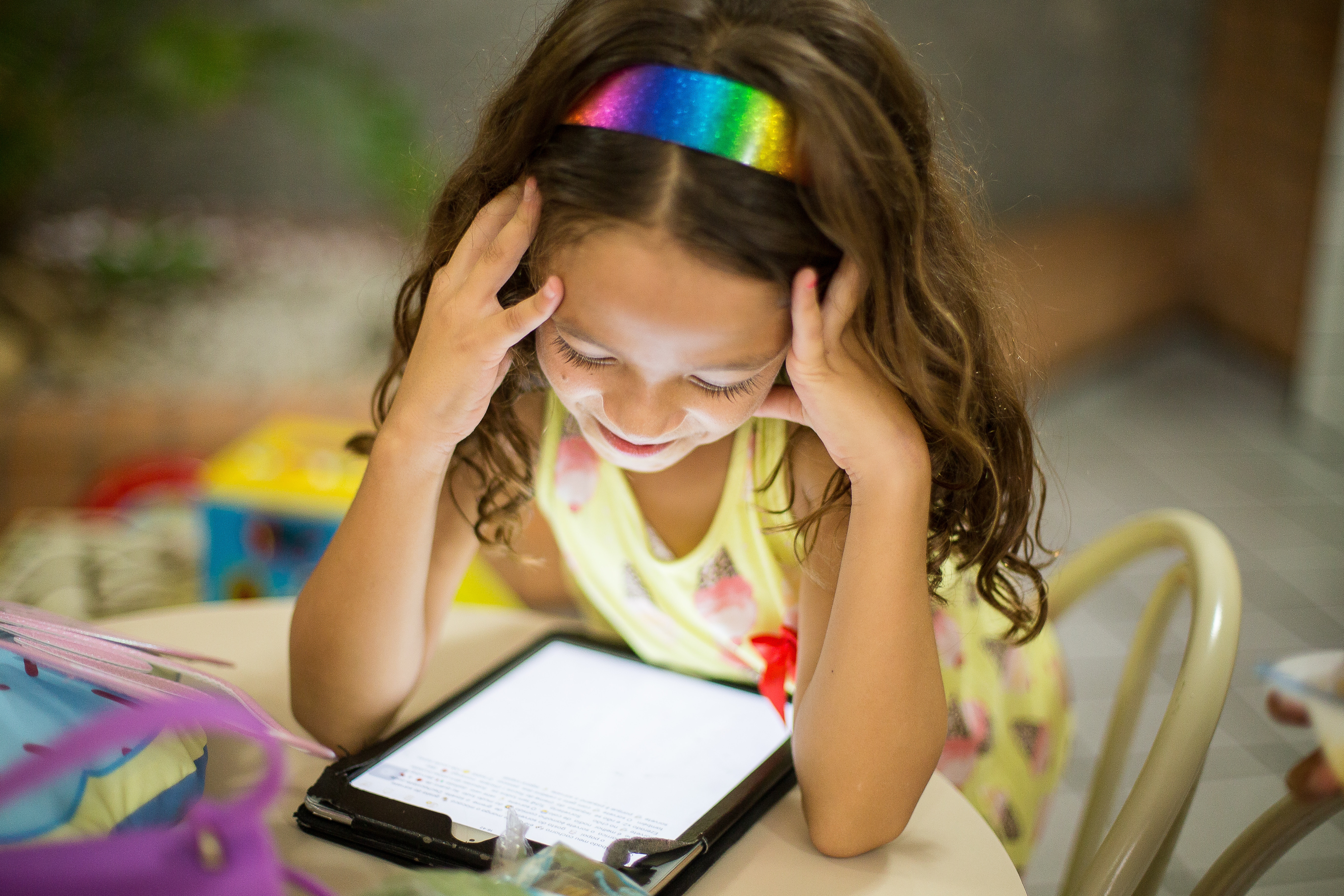 a child working on a tablet