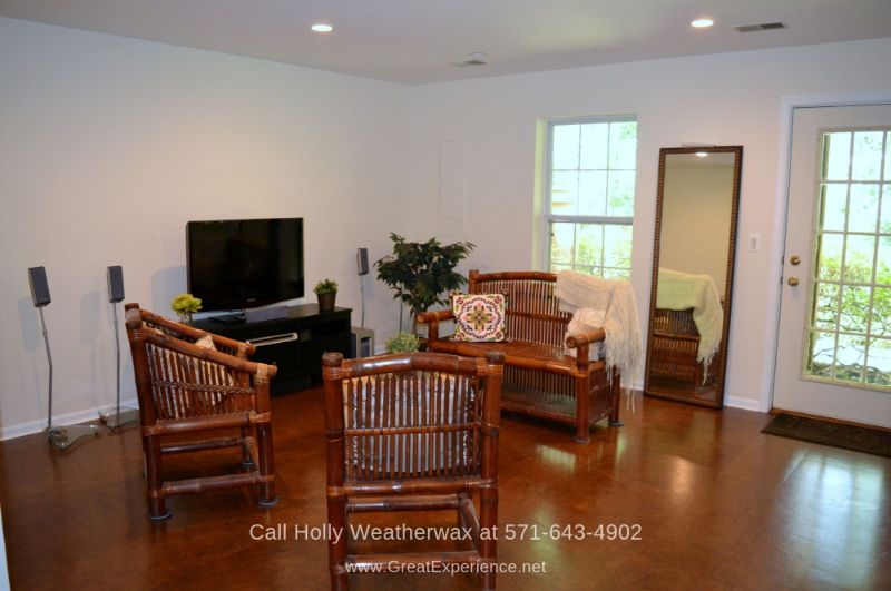 Townhomes in Reston Northern VA - Relax and enjoy bonding moments with your loved ones in this generously spaced family room of this Reston VA townhome. 